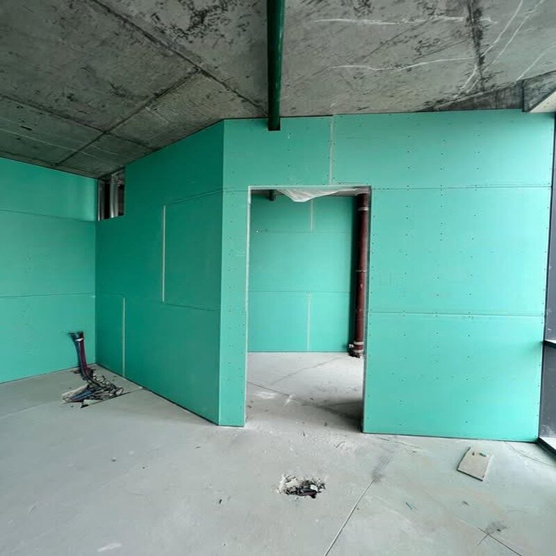Green gypsum board wall installation